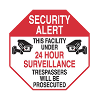 A security alert sign with some cameras on it